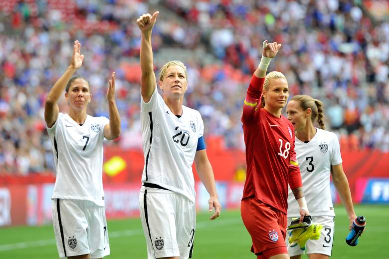 Members of the U.S. Soccer Team wave to the crowd following a win over Nigeria. (Getty)