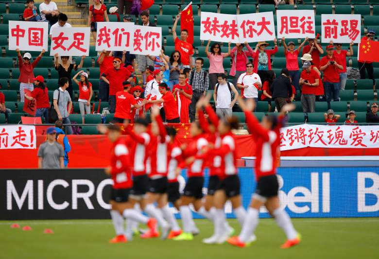 EDMONTON, AB - JUNE 20:  Fans of China PR cheer prior to the FIFA Women's World Canada 2015 Round of 16 match between China PR and Cameroon at Commonwealth Stadium on June 20, 2015 in Edmonton, Canada.  (Photo by Kevin C. Cox/Getty Images)