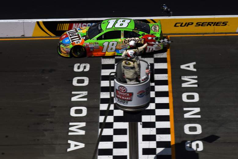 Kyle Busch takes the checkered flag in the Toyota/Save Mart 350. (Getty)