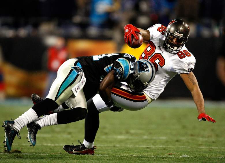 CHARLOTTE, NC - DECEMBER 08:  Jerramy Stevens #86 of the Tampa Bay Buccaneers is tackled by Richard Marshall #31 of the Carolina Panthers at Bank of America Stadium on December 8, 2008 in Charlotte, North Carolina.  (Photo by Streeter Lecka/Getty Images)