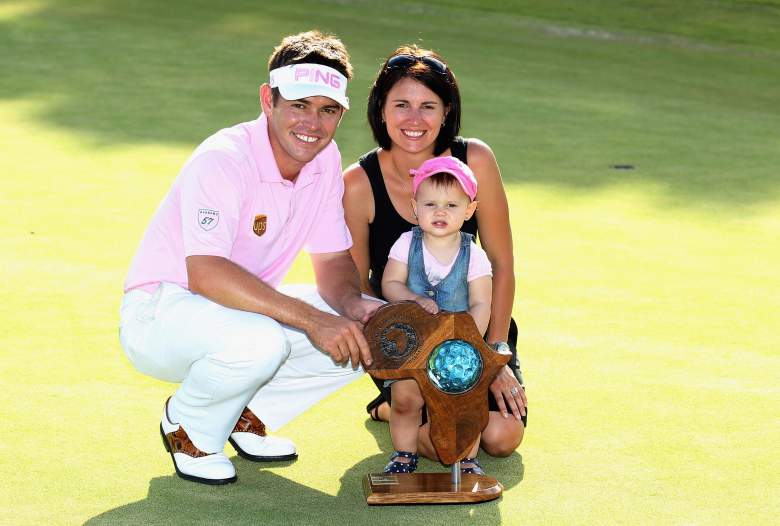 EAST LONDON, SOUTH AFRICA - JANUARY 09:  Louis Oosthuizen of South Africa poses with his wife Nel-Mare and daughter Jana after winning the Africa Open after a three way play-off against Chris Wood of England and Manuel Quiros of Spain at East London GC on January 9, 2011 in East London, South Africa.  (Photo by Warren Little/Getty Images)