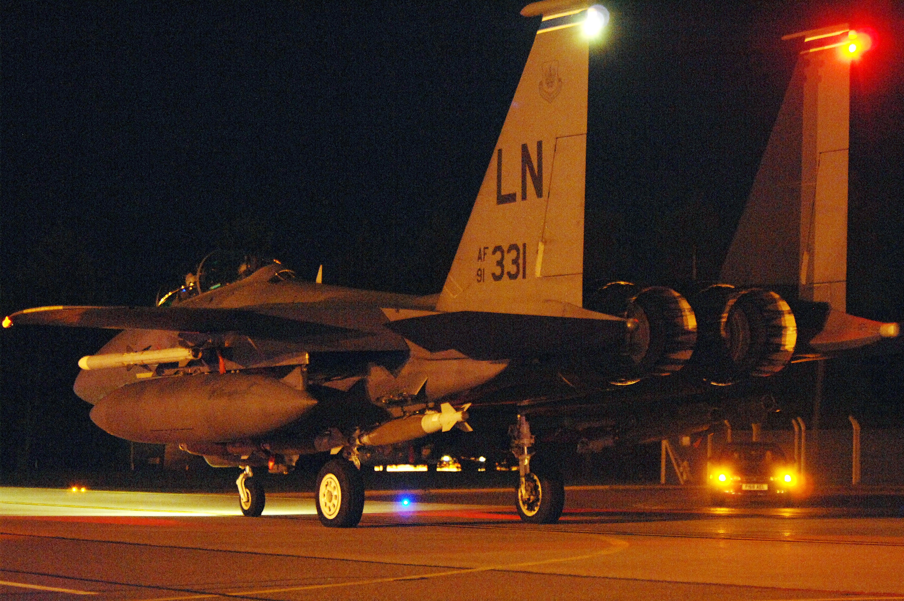In this handout image provided by the U.S. Air Force, an F-15E Strike Eagle taxis down the runway prior to departure from RAF Lakenheath in preparation for Operation Odyssey Dawn missions March 19, 2011 in Lakenheath, United, Kingdom.  (Getty)