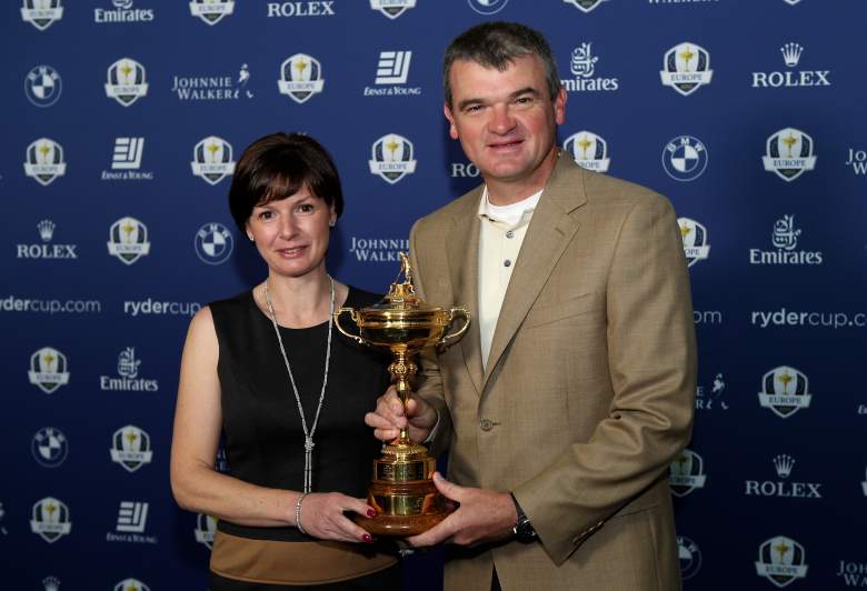 LONDON, ENGLAND - SEPTEMBER 24:  Paul Lawrie of Scotland and his wife Marian pose with the Ryder cup as the Europe team depart for the Ryder Cup from Heathrow Airport on September 24, 2012 in London, England.  (Photo by Andrew Redington/Getty Images)