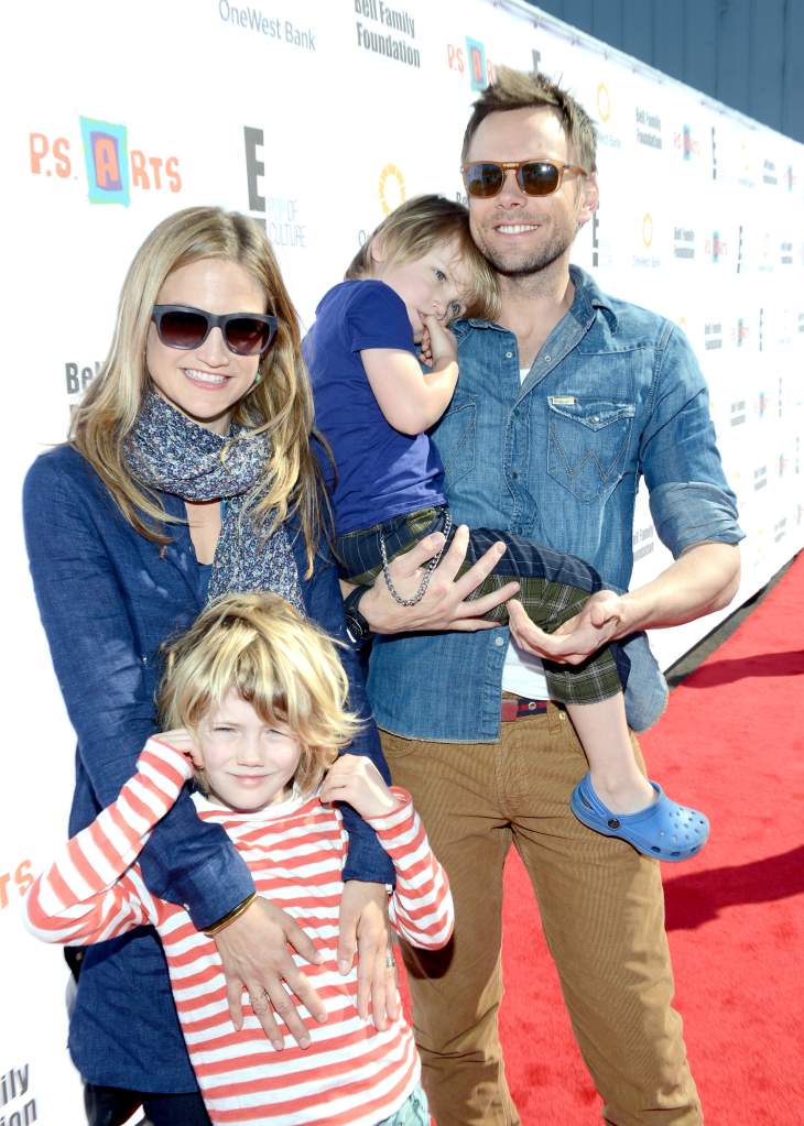 SANTA MONICA, CA - NOVEMBER 11:  Actor Joel McHale (R) with his wife Sarah Williams, and their sons Eddie and Isaac attend the creative arts fair and family day "Express Yourself", supporting P.S. ARTS, at Barker Hangar on November 11, 2012 in Santa Monica, California.  (Photo by Michael Buckner/Getty Images For P.S. ARTS)