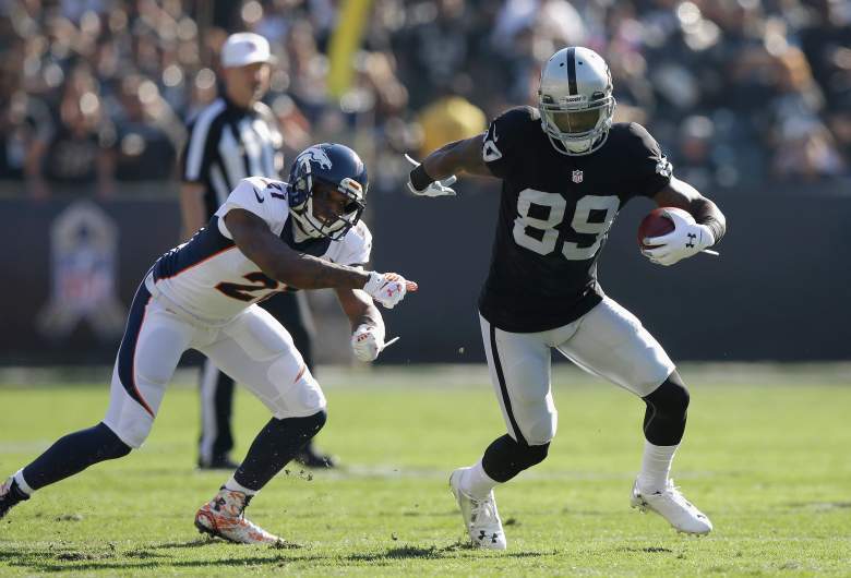 OAKLAND, CA - NOVEMBER 09: James Jones #89 of the Oakland Raiders fights off Aqib Talib #21 of the Denver Broncos in the first half at O.co Coliseum on November 9, 2014 in Oakland, California.  (Photo by Ezra Shaw/Getty Images)