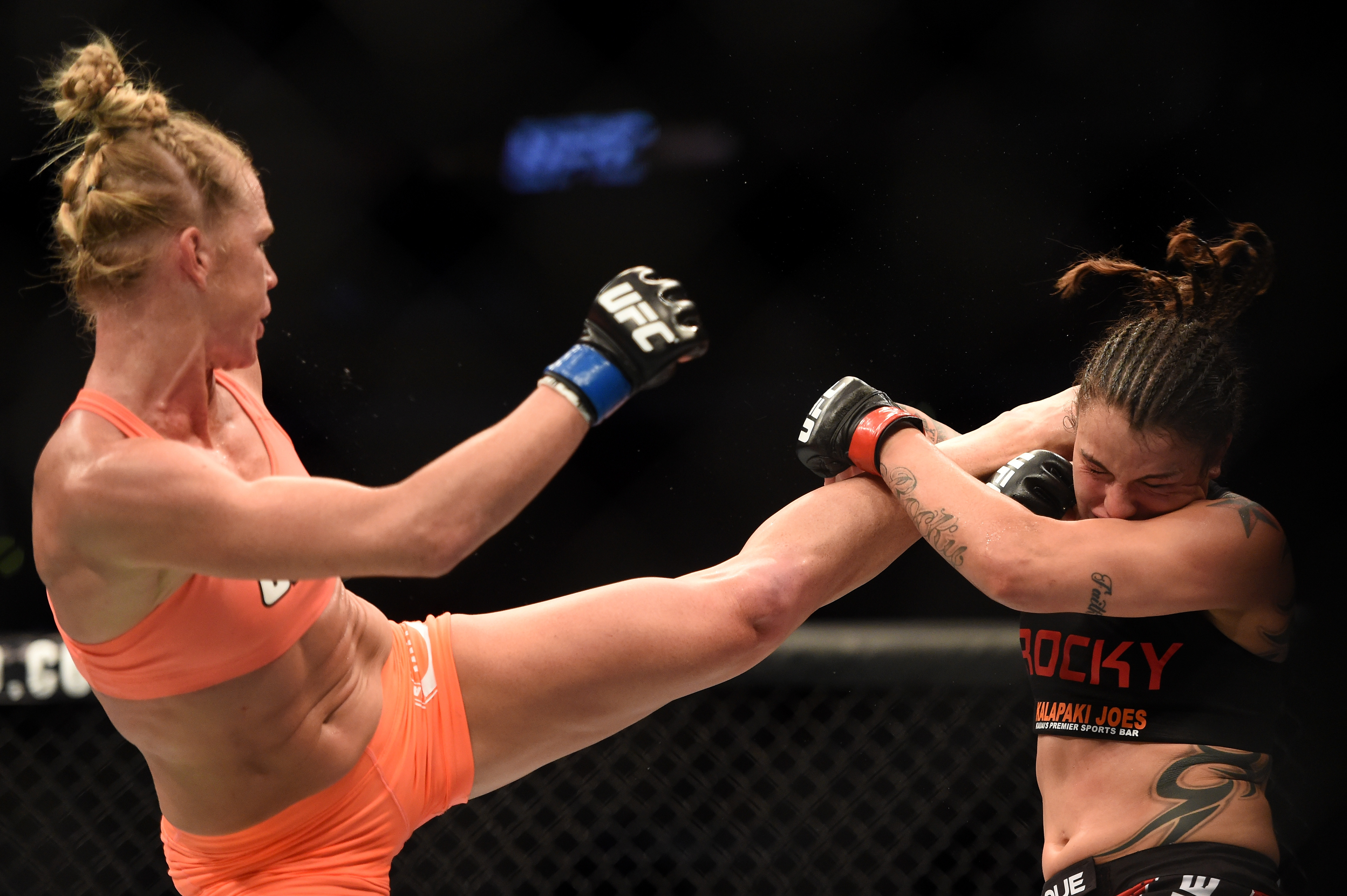 Holly Holm, seen kicking Raquel Pennington, will face Marian Reneau at UFC Fight Night. (Getty)
