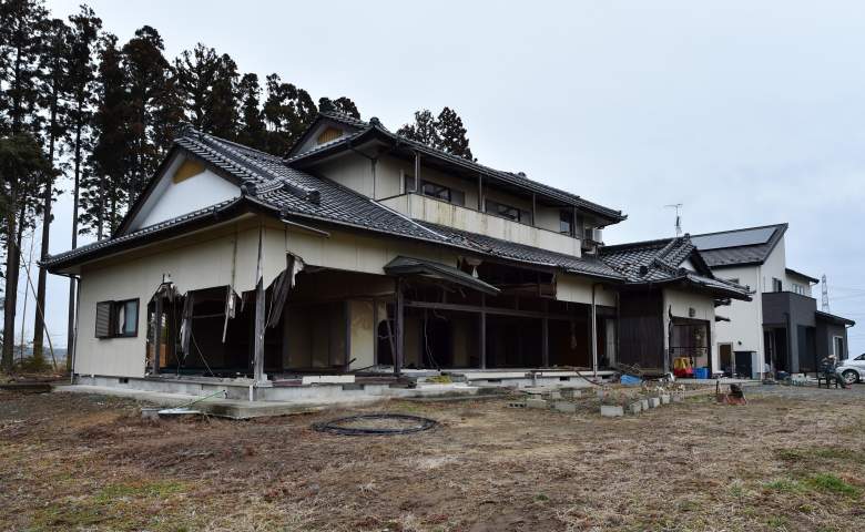 In a picture taken on March 8, 2015, shows Takayuku Ueno's house destroyed by the March 11, 2011 earthquake and tsunami disaster at Kaibama area in Minami-soma, north of the Fukushima Daiichi nuclear power plant. In cold drizzle Takayuki Ueno combs a desolate winter beach for the bones of his three-year-old son, unable to move on in his grief until he finds the remains of a boy killed by Japan's monstrous tsunami four years ago. (Getty Images)