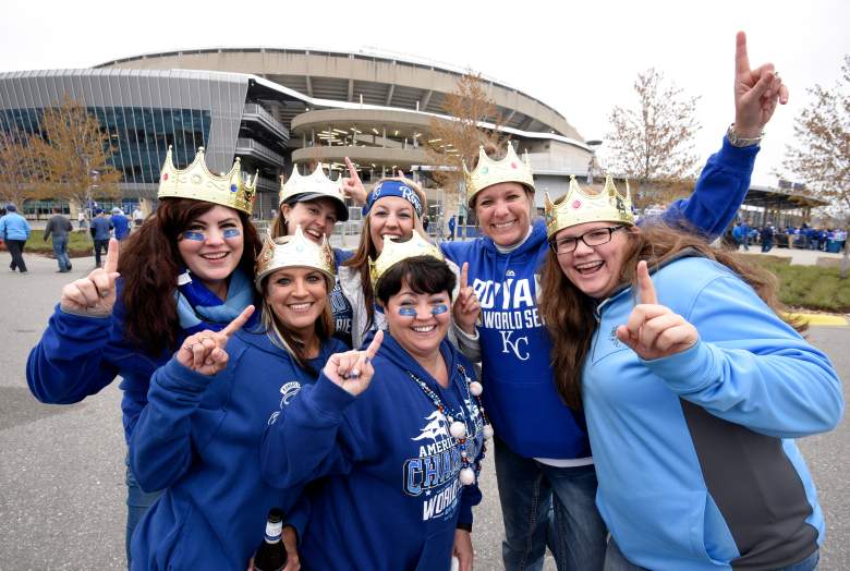 KANSAS CITY, MO - APRIL 6:  Kansas City Royals fans pose for a photo in the parking lot prior to a an opening day game between the Chicago White Sox  and Kansas City Royals on April 6, 2015 during opening day at Kauffman Stadium in Kansas City, Missouri. (Photo by Ed Zurga/Getty Images)