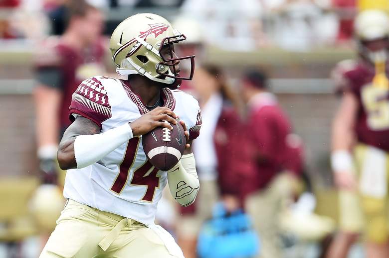 TALLAHASSEE, FL - APRIL 11:  De'Andre Johnson #14 of the Gold team drops back to pass against the Garnet team during Florida State's Garnet and Gold spring game at Doak Campbell Stadium on April 11, 2015 in Tallahassee, Florida.  (Photo by Stacy Revere/Getty Images)