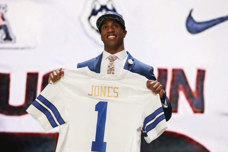 CHICAGO, IL - APRIL 30:  Byron Jones of the Connecticut Huskies holds up a jersey after being picked #27 overall by the Dallas Cowboys during the first round of the 2015 NFL Draft at the Auditorium Theatre of Roosevelt University on April 30, 2015 in Chicago, Illinois.  (Photo by Jonathan Daniel/Getty Images)