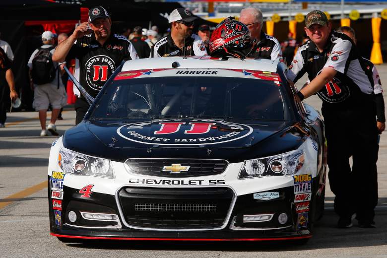 The crew moves Kevin Harvick's car during practice at Daytona. (Getty)
