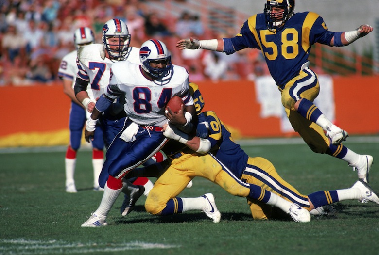 Barnett plays against the Rams in 1983. (Getty)