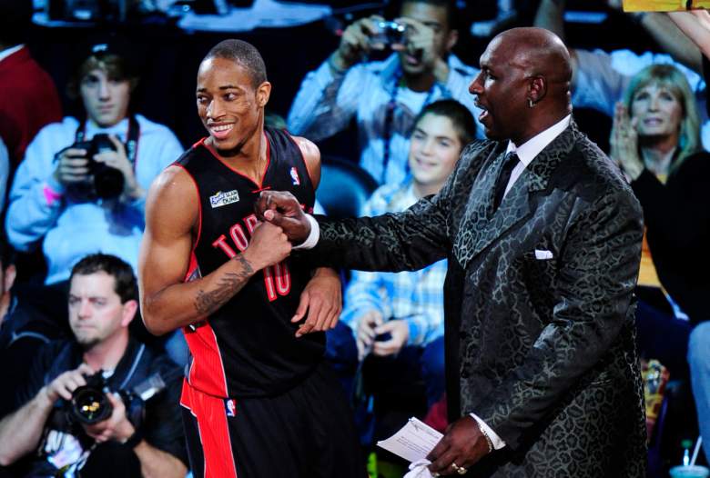 DeMar DeRozan of the Toronto Raptors (L) reacts with his coach Darryl Dawkins during the Slam Dunk Contest at NBA All-Star Saturday Night at Staples Center in Los Angeles February 19, 2011. AFP PHOTO / Robyn Beck (Photo credit should read ROBYN BECK/AFP/Getty Images)