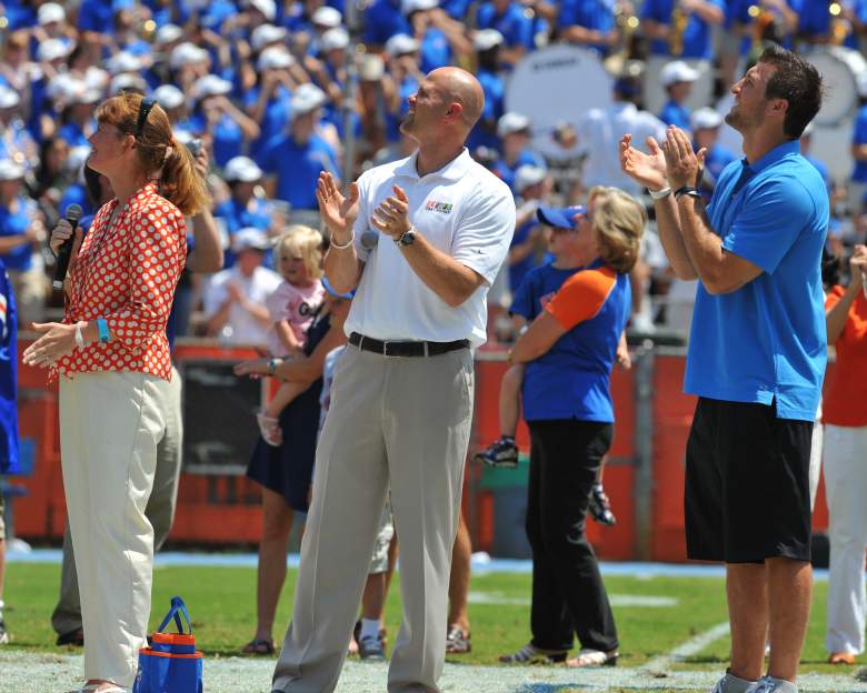 GAINESVILLE, FL - APRIL 9: Amy Moody (left), the daughter of Steve Spurrier, Danny Wuerffel and Tim Tebow watch a scoreboard as life-size statues of the Florida Gators three Heisman trophy winners are unveiled at halftime of the Orange and Blue spring football game April 9, 2011 Ben Hill Griffin Stadium at Gainesville, Florida. (Photo by Al Messerschmidt/Getty Images)