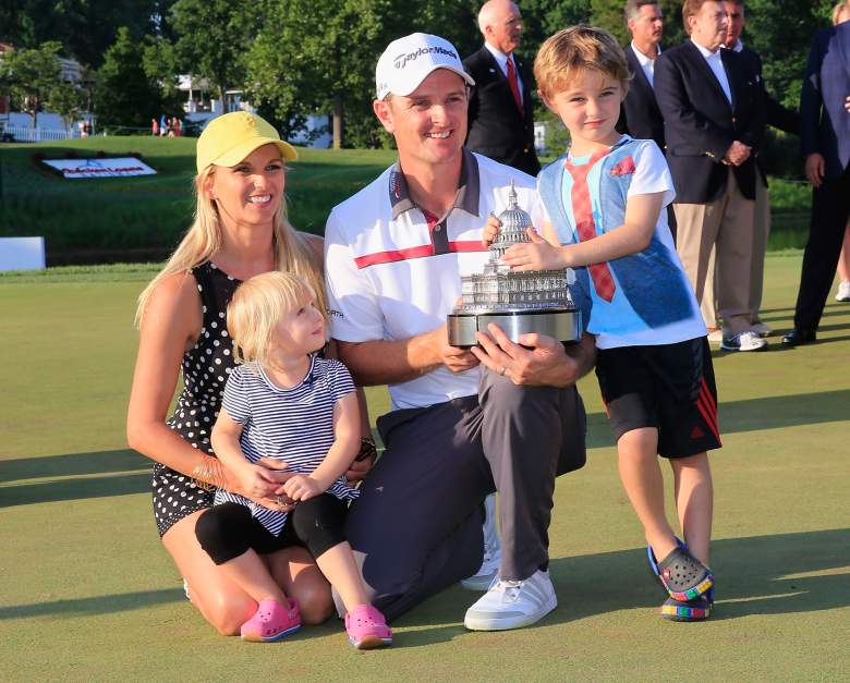 BETHESDA, MD - JUNE 29: Justin Rose of England holds the trophy and poses with his wife Kate and children Charlotte and Leo after winning the Quicken Loans National at Congressional Country Club on June 29, 2014 in Bethesda, Maryland.  (Photo by Rob Carr/Getty Images)