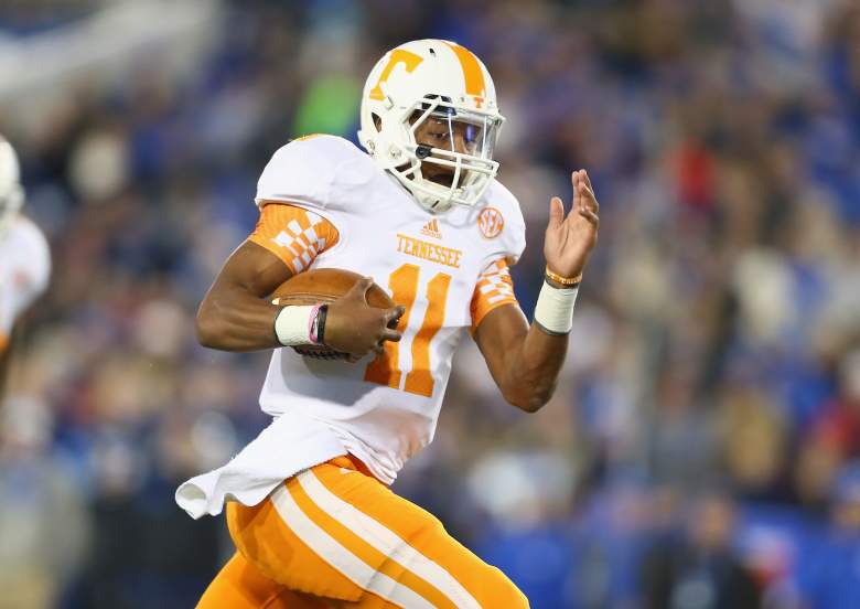 LEXINGTON, KY - NOVEMBER 30: Joshua Dobbs #11 of the Tennessee Volunteers runs for a touchdown during the game against the Kentucky Wildcats at Commonwealth Stadium on November 30, 2013 in Lexington, Kentucky. (Photo by Andy Lyons/Getty Images)