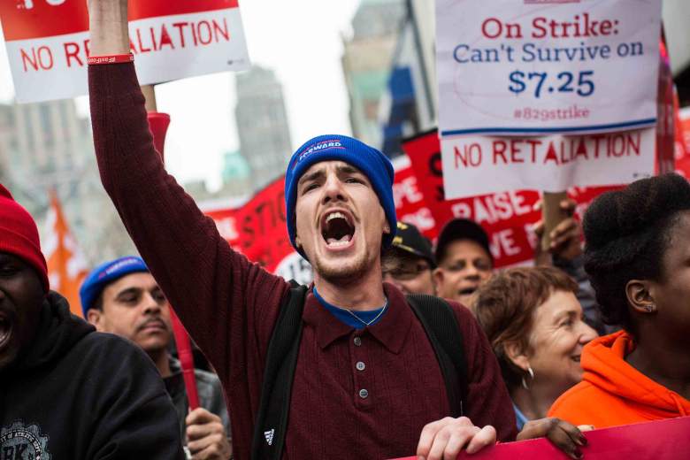 Protesters rally outside of a Wendy's in support of raising fast food wages from $7.25 per hour to $15.00 per hour on December 5, 2013 in the Brooklyn borough of New York City. A growing number of fast food workers in the United States have been staging protests outside restaurants, calling for a raise in wages, claiming it is impossible to live resonably while earning minimum wage.  (Getty Images)