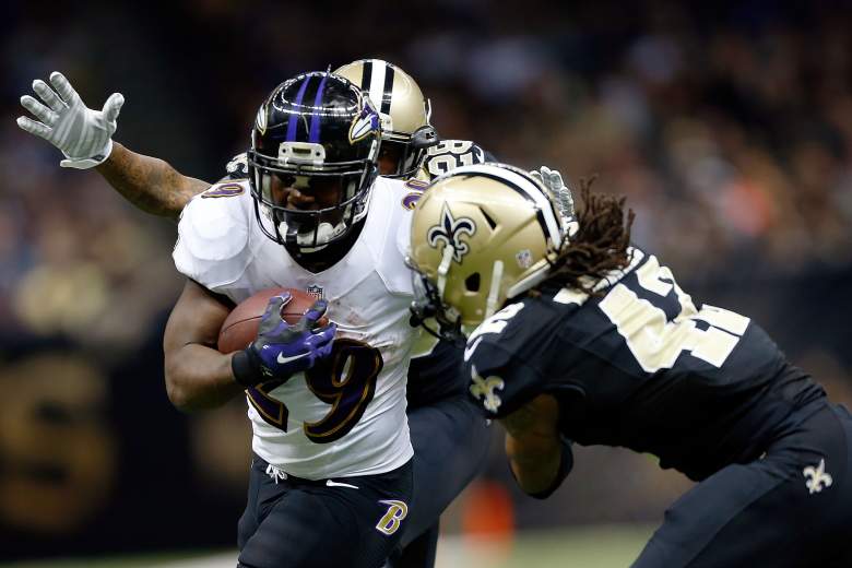 NEW ORLEANS, LA - NOVEMBER 24: Justin Forsett #29 of the Baltimore Ravens is pursued by Keenan Lewis #28 and Pierre Warren #42 of the New Orleans Saints during the second quarter of a game at the Mercedes-Benz Superdome on November 24, 2014 in New Orleans, Louisiana. (Photo by Wesley Hitt/Getty Images)