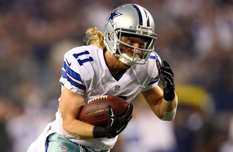 ARLINGTON, TX - DECEMBER 21: Cole Beasley #11 of the Dallas Cowboys runs for a touchdown after making the catch against the Indianapolis Colts in the first half at AT&T Stadium on December 21, 2014 in Arlington, Texas. (Photo by Ronald Martinez/Getty Images)