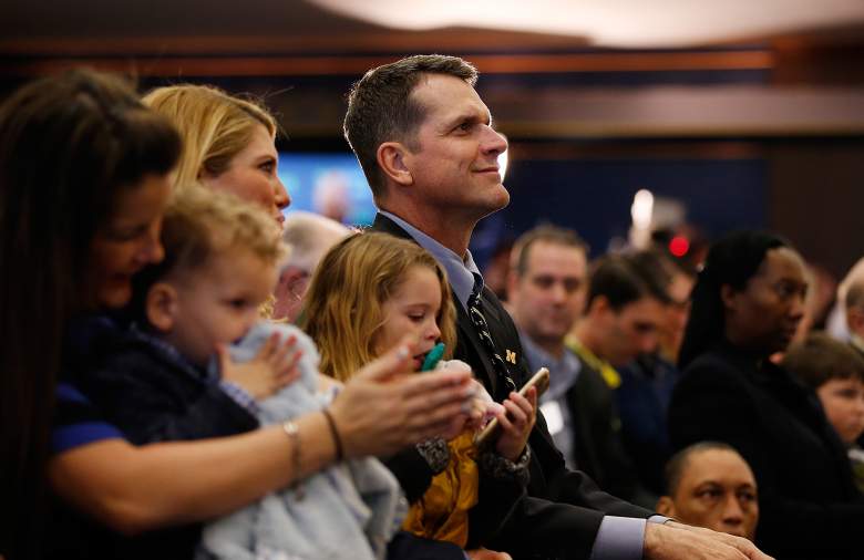 ANN ARBOR, MI - DECEMBER 30: Jim Harbaugh looks on with his family as he is introduced as the new Head Coach of the University of Michigan football team at the Junge Family Champions Center on December 30, 2014 in Ann Arbor, Michigan. (Photo by Gregory Shamus/Getty Images)