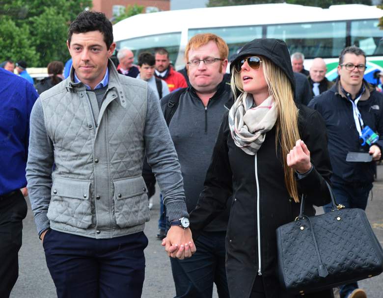 NEWCASTLE, NORTHERN IRELAND - MAY 31: Rory McIlroy of Northern Ireland arrives at the course with new girlfriend Erica Stoll during the fourth round of the Dubai Duty Free Irish Open hosted by the Rory Foundation at Royal County Down Golf Club on May 31, 2015 in Newcastle, Northern Ireland. (Photo by Mark Runnacles/Getty Images)