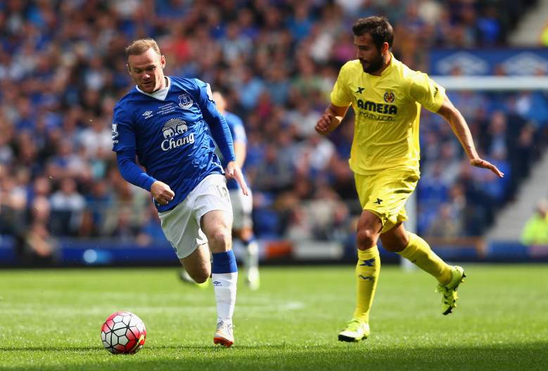 Wayne Rooney L) donned the Everton shirt one more time in Duncan Fergusons testimonial this week. Getty)