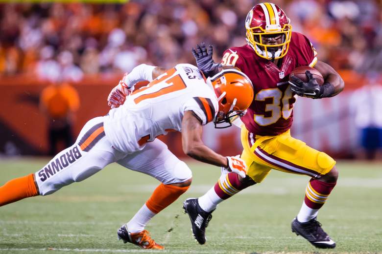 CLEVELAND, OH - AUGUST 13: Cornerback Kendall James #37 of the Cleveland Browns tackles strong safety Kyshoen Jarrett #30 of the Washington Redskins during the second half at FirstEnergy Stadium on August 13, 2015 in Cleveland, Ohio. The Redskins defeated the Browns 20-17. (Photo by Jason Miller/Getty Images)