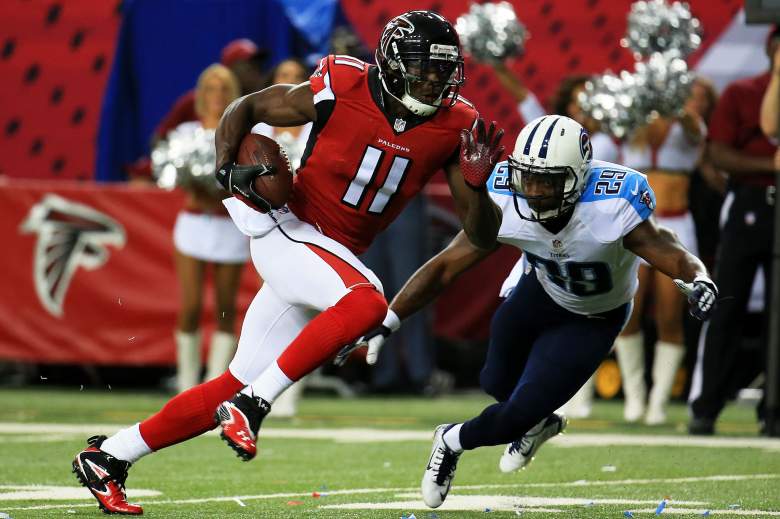 ATLANTA, GA - AUGUST 14: Julio Jones #11 of the Atlanta Falcons runs past Perrish Cox #29 of the Tennessee Titans on route for a touchdown in the first half of a preseason game at the Georgia Dome on August 14, 2015 in Atlanta, Georgia. (Photo by Daniel Shirey/Getty Images)