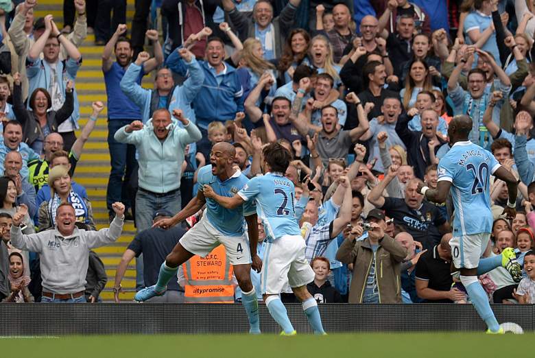 Manchester City's Belgian defender Vincent Kompany (L) celebrates with Manchester City's Spanish midfielder David Silva (2nd L) after scoring their second goal the English Premier League football match between Manchester City and Chelsea at The Etihad stadium in Manchester, north west England on August 16, 2015. AFP PHOTO / OLI SCARFF RESTRICTED TO EDITORIAL USE. No use with unauthorized audio, video, data, fixture lists, club/league logos or 'live' services. Online in-match use limited to 75 images, no video emulation. No use in betting, games or single club/league/player publications. (Photo credit should read OLI SCARFF/AFP/Getty Images)