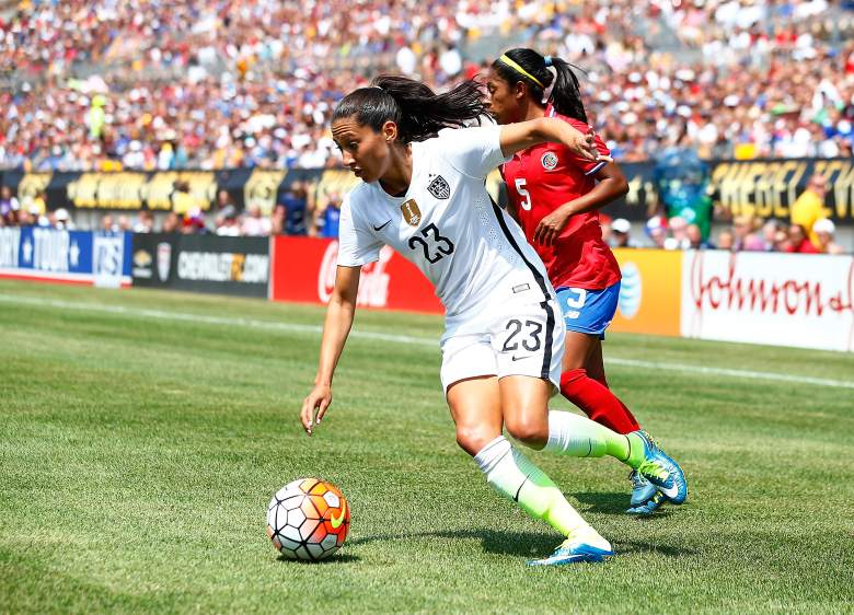 PITTSBURGH, PA - AUGUST 16: Christen Press #23 of the United States carries the ball along the endline in front of Diana Saenz #5 of Costa Rica in the first half during the match at Heinz Field on August 16, 2015 in Pittsburgh, Pennsylvania. (Photo by Jared Wickerham/Getty Images)