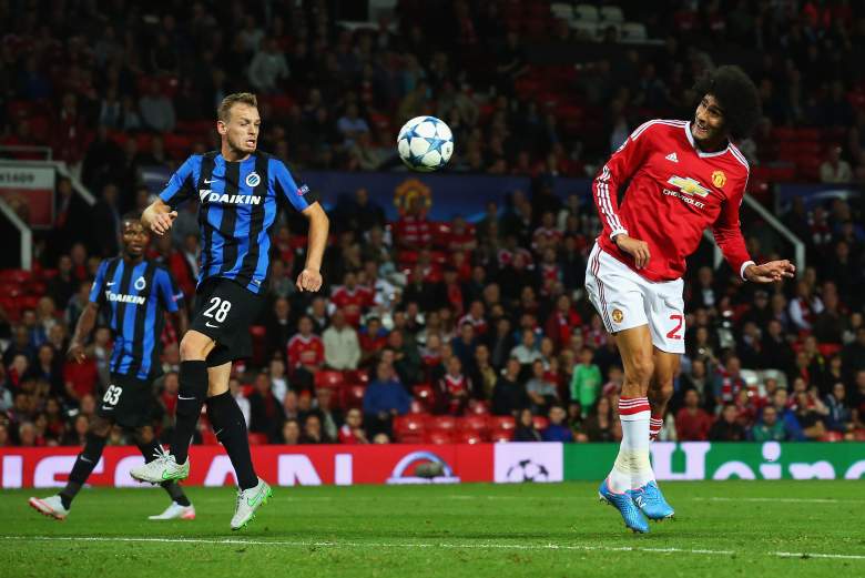 A late goal from marouane fellaini R) gave Manchester United extra cushion heading into the second leg against club Brugge. 