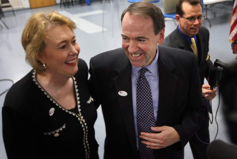 NORTH LITTLE ROCK, AR - FEBRUARY 05:  Former Arkansas Governor and Republican presidential hopeful Mike Huckabee (R) receives an "I Voted" sticker as he and his wife Janet cast their ballots for the Presidential nominee in Mary's Hall at St. Anne's Catholic Church on Super Tuesday February 5, 2008 in North Little Rock, Arkansas. Voters in 24 states head to the polls today in the U.S. presidential election's biggest primary day, Super Tuesday.   (Photo by Rick Gershon/Getty Images)