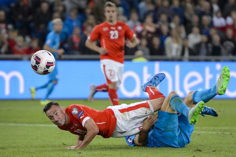 Swiss forward Josip Drmic (L) scored the winning goal against Slovenia. Getty)
