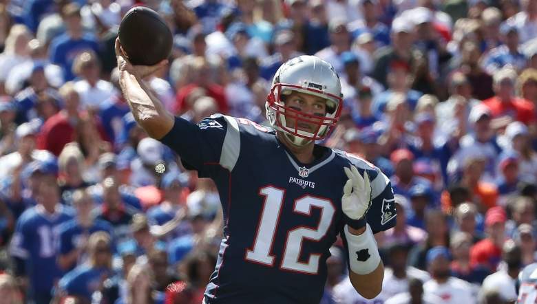 Tom Brady of the Patriots leads the NFL in yards and passing touchdowns after 2 weeks. (Getty)