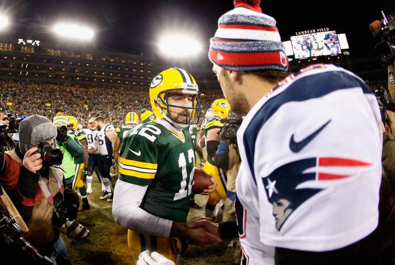 Aaron Rodgers, left, and Tom Brady have combined for 20 touchdowns and zero interceptions in 2015. (Getty)
