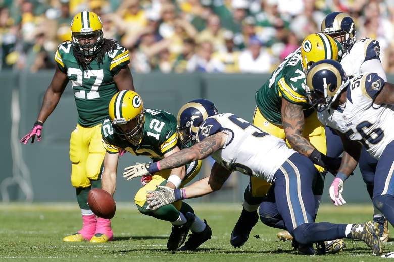 Aaron Rodgers L) threw a pair of interceptions and fumbled, but still led the Packers to a 5-0 record with a win vs. St. Louis.