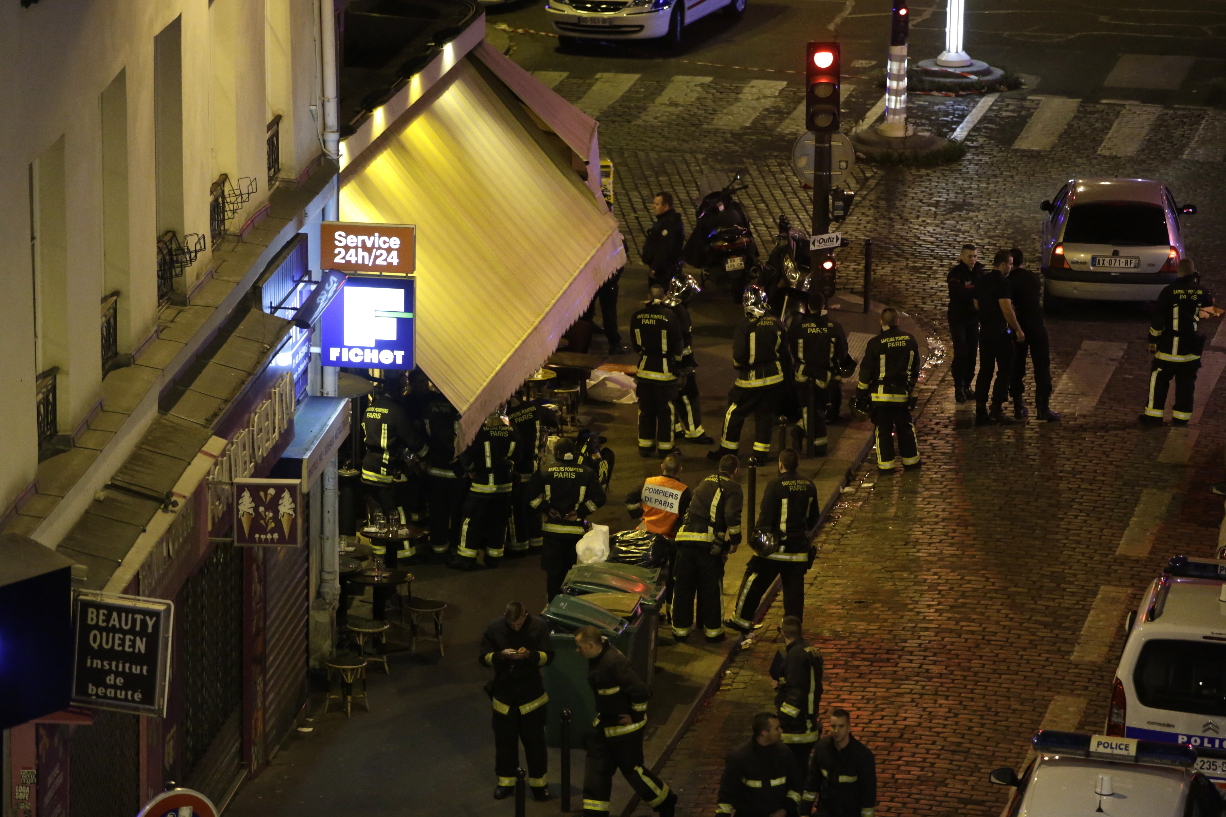 Police are seen outside a restaurant in 10th arrondissement of the French capital Paris. (Getty)