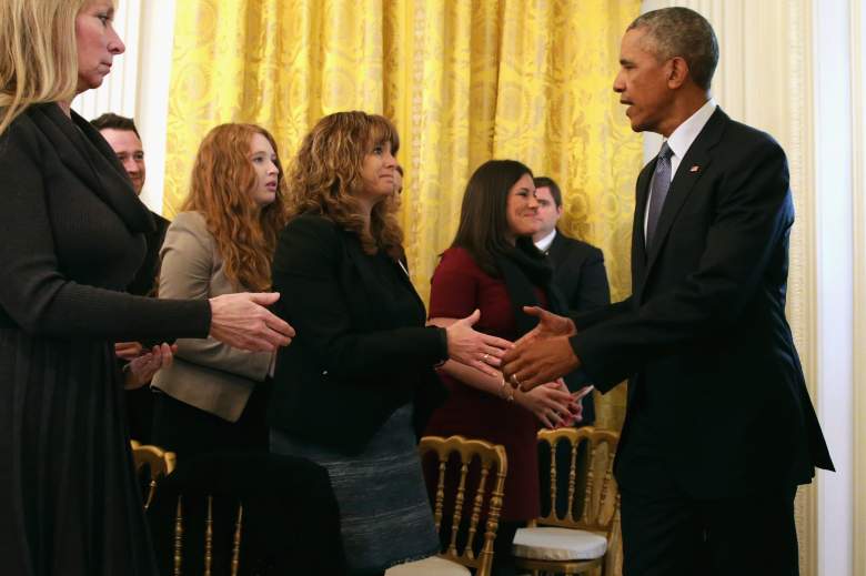 Barack Obama, seen here greeting victims of gun violence in the White House, will address a town hall audience at 8 p.m.  on CNN. Getty)