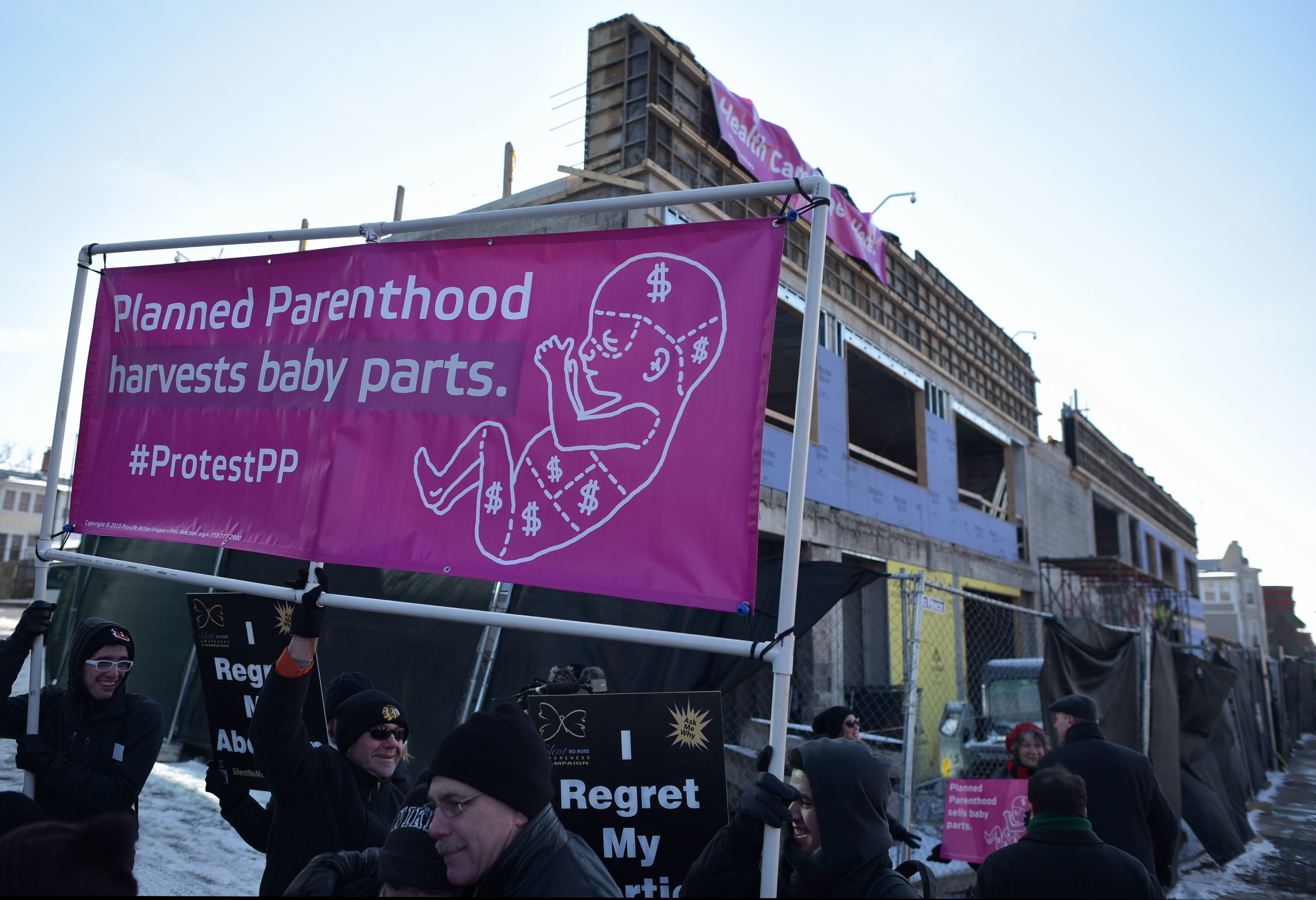 Anti-abortion activists take part in a protest outside of a Planned Parenthood center construction site on January 21, 2016 in Washington, DC. (Getty)
