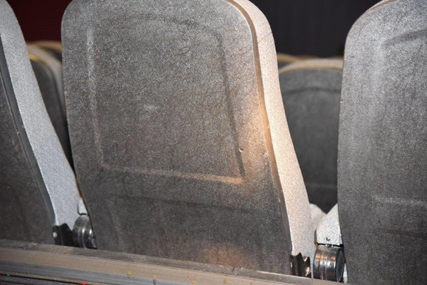 The bullet hole left in a theater seat after the shooting. (Renton Police)