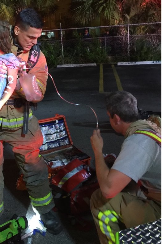 Firefighters rescued the 6-year-old girl from the burning apartment. (Miami-Dade Fire Rescue)