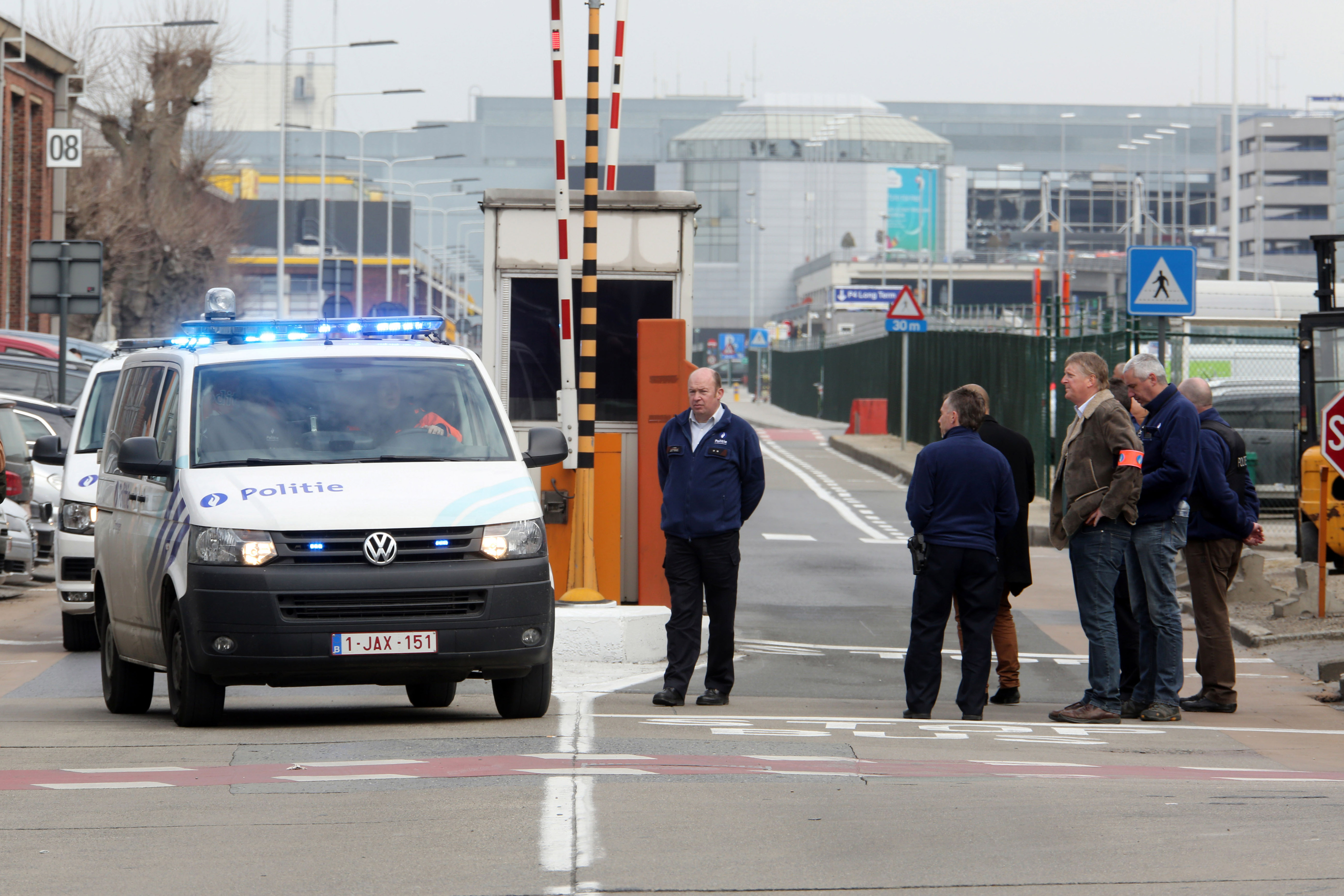 Police vehicles leave Zaventem Bruxelles International Airport. (Getty)