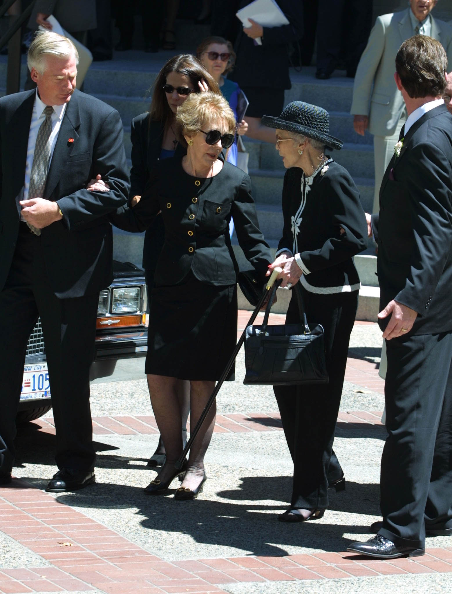 Former US first lady Nancy Reagan (2nd L) talks with Jane Wyman  after the funeral of Maureen Reagan at the Cathedral of the Blessed Sacrament August 18, 2001, in Sacramento, California. (Getty)