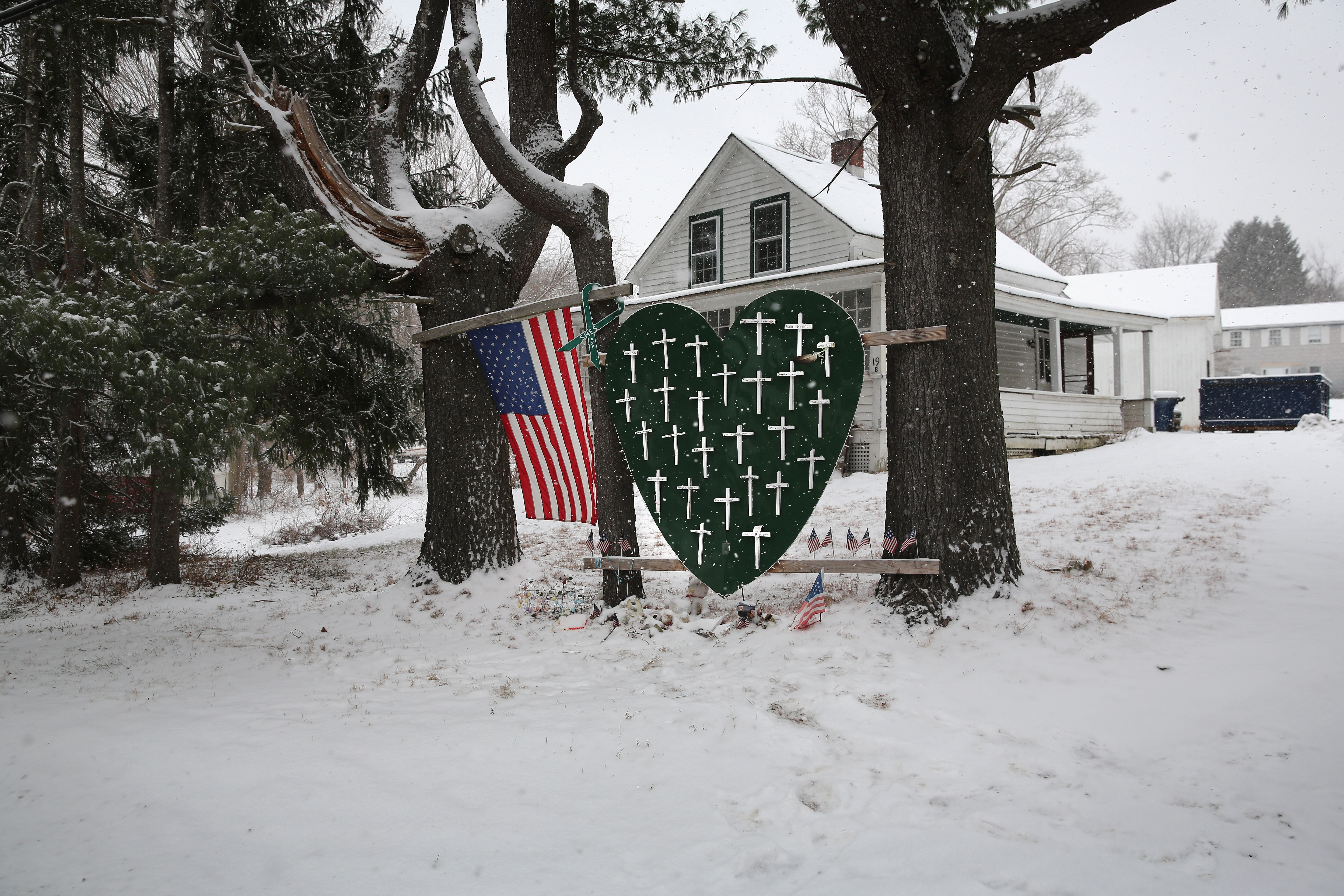 A memorial to massacre victims stands near the former site of Sandy Hook Elementary on December 14, 2013 in Newtown, Connecticut. (Getty)