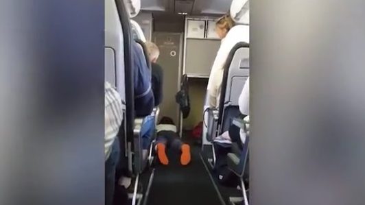 Watch Woman Has Meltdown On Frontier Airlines Flight