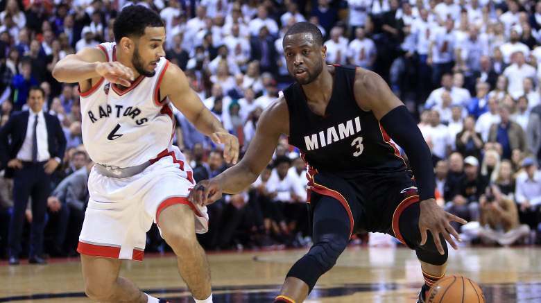 Dwyane Wade #3 of the Miami Heat dribbles the ball as Cory Joseph #6 of the Toronto Raptors defends. (Getty)