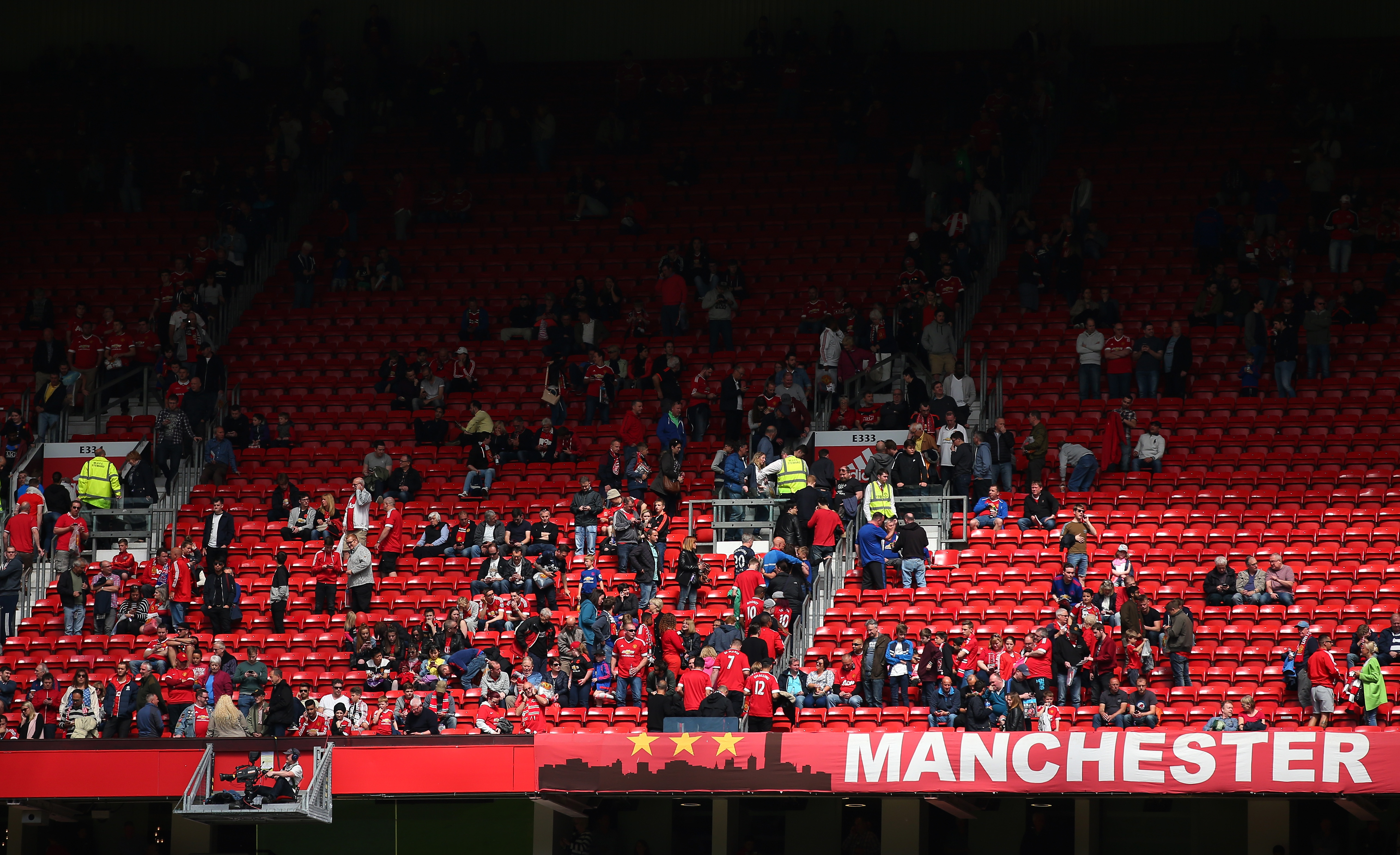 Fans are evacuated from the ground as the match is abandoned ahead of the Barclays Premier League match between Manchester United and AFC Bournemouth at Old Trafford on May 15, 2016 in Manchester, England. (Getty)
