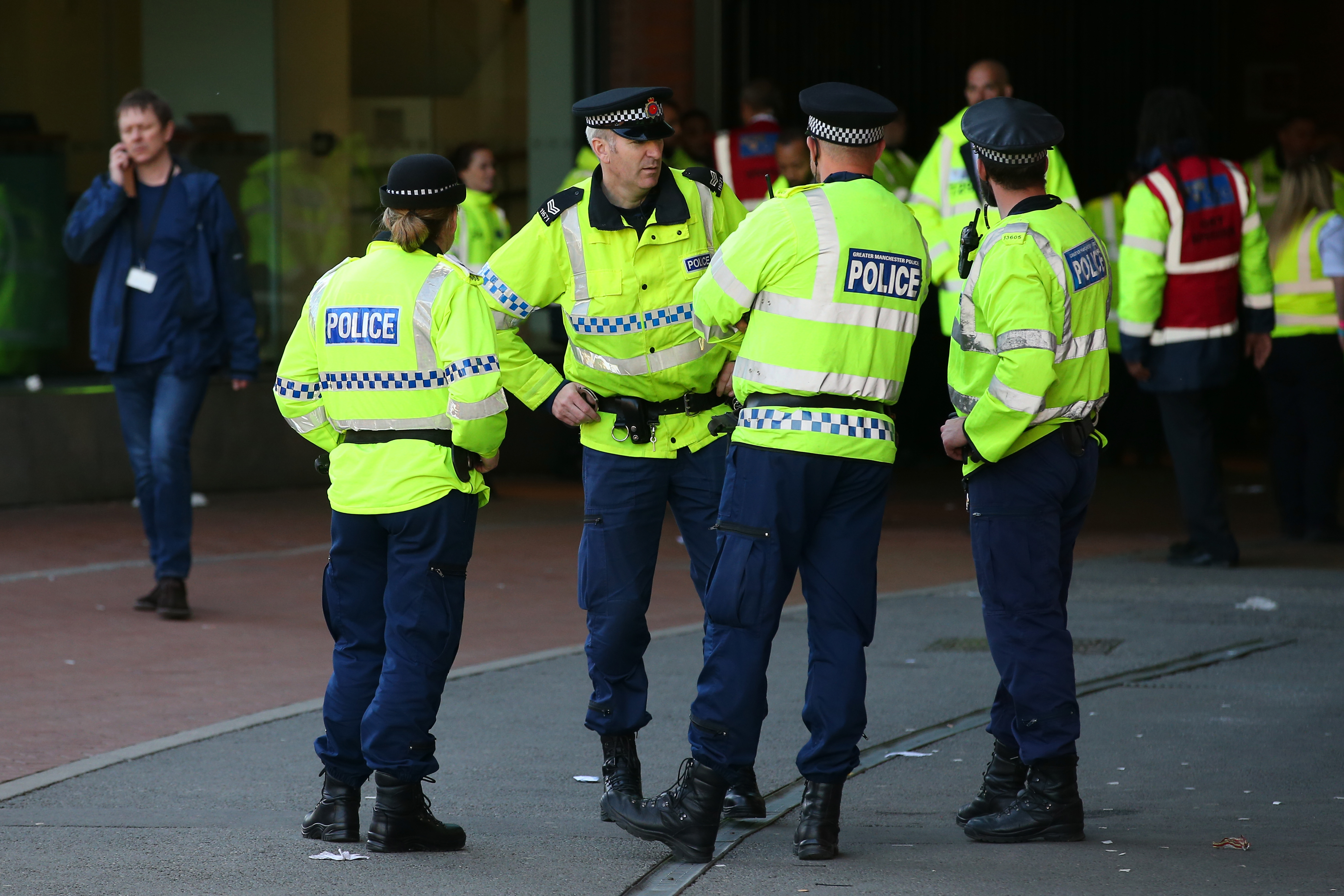 Police patrol outside after the game was abandoned with fans evacuated from the ground prior to the Barclays Premier League match between Manchester United and AFC Bournemouth at Old Trafford on May 15, 2016 in Manchester, England. (Getty)