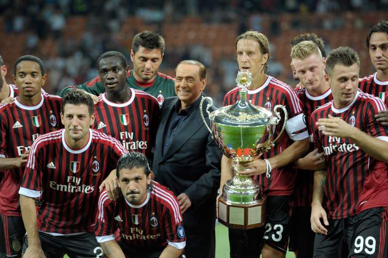 Silvio Berlusconi celebrates after AC Milan won the Berlusconi Trophy match between AC Milan and Juventus FC in August 2011. (Getty)