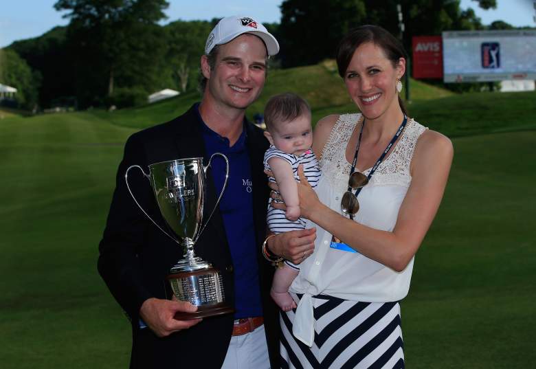 Kevin Streelman poses with daughter Sophia and wife Courtney after winning the Travelers Championship golf tournament in 2014. (Getty)